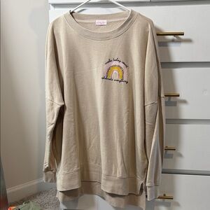 Pink Lily Cream Sweatshirt with Rainbow Graphic
